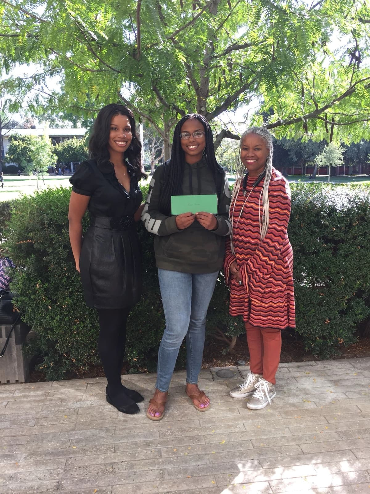 A WHD scholar receiving an award